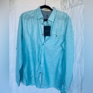 Man shirt , Ted baker size 4 I believe that it’s small , new !!